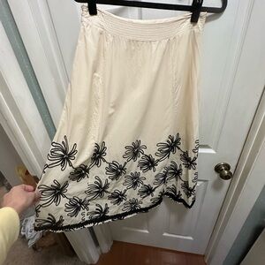 Chic Cream A-Line Skirt with Black Floral Embroidery
